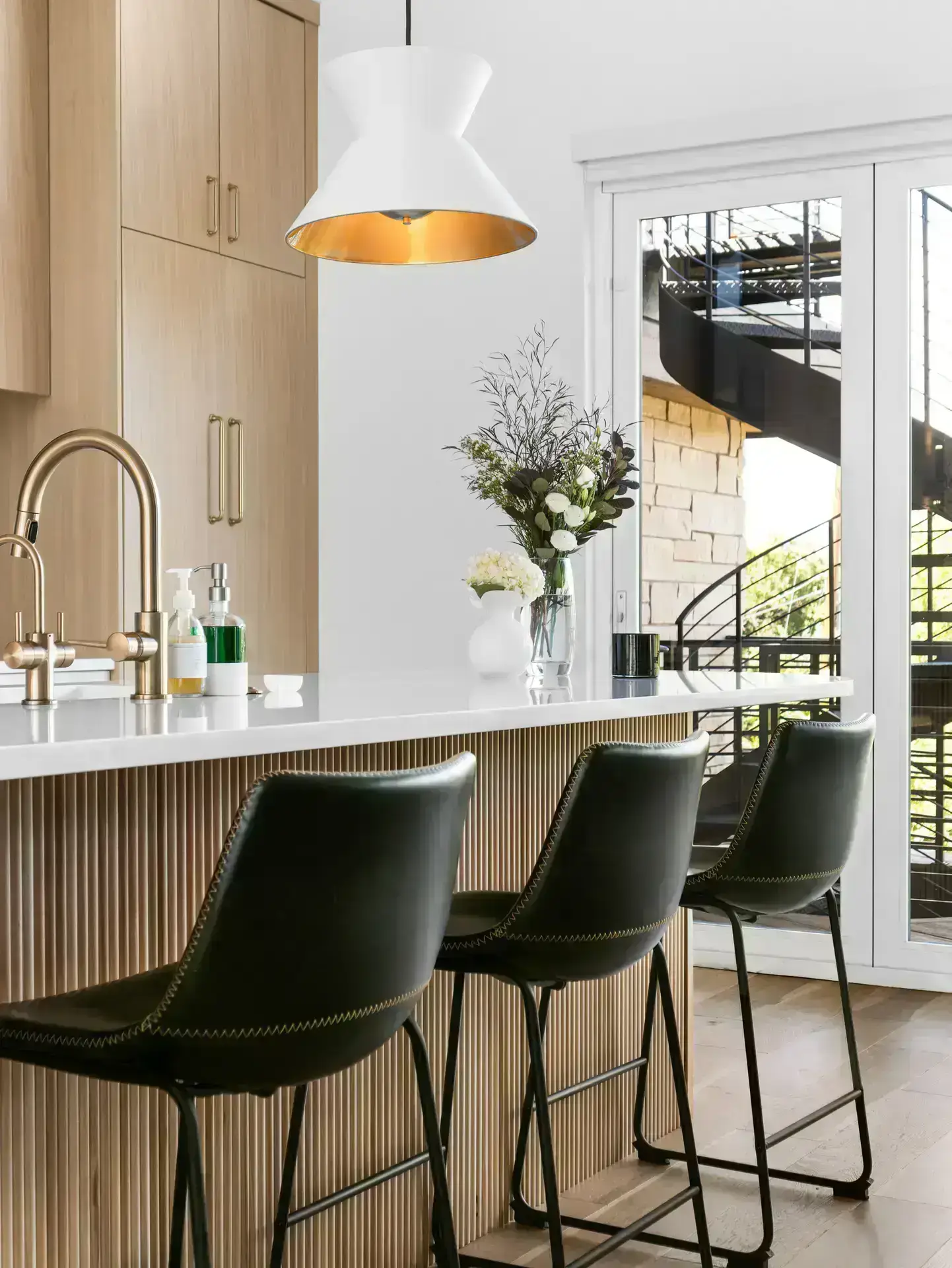 Kitchen island of a Work Shop Colorado new home