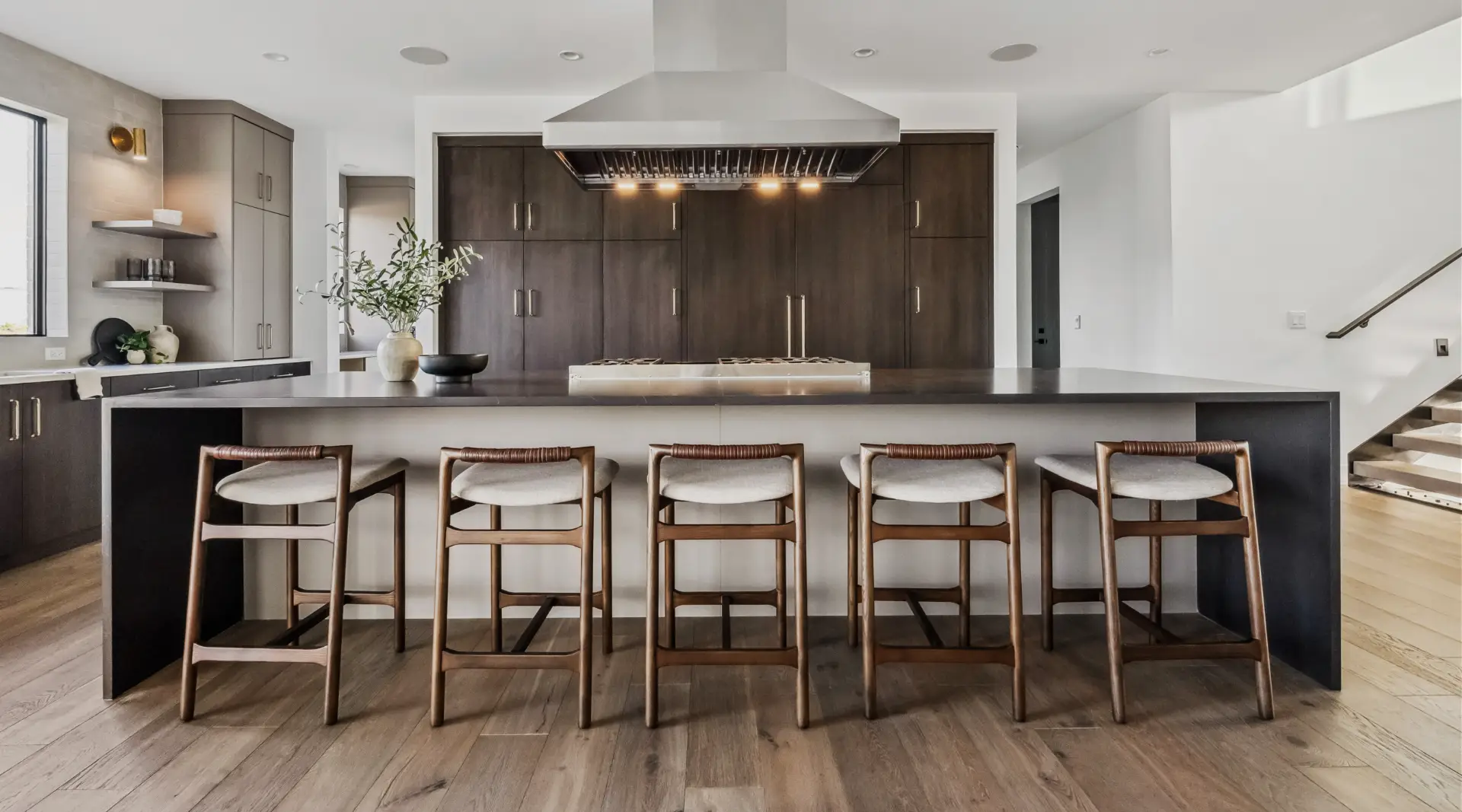 Modern luxury kitchen featuring custom cabinets, high-end finishes, and a sleek, sophisticated design in a new home.
