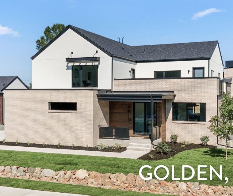 Modern luxury home exterior with mixed brick and stucco in Applewood West Golden Colorado