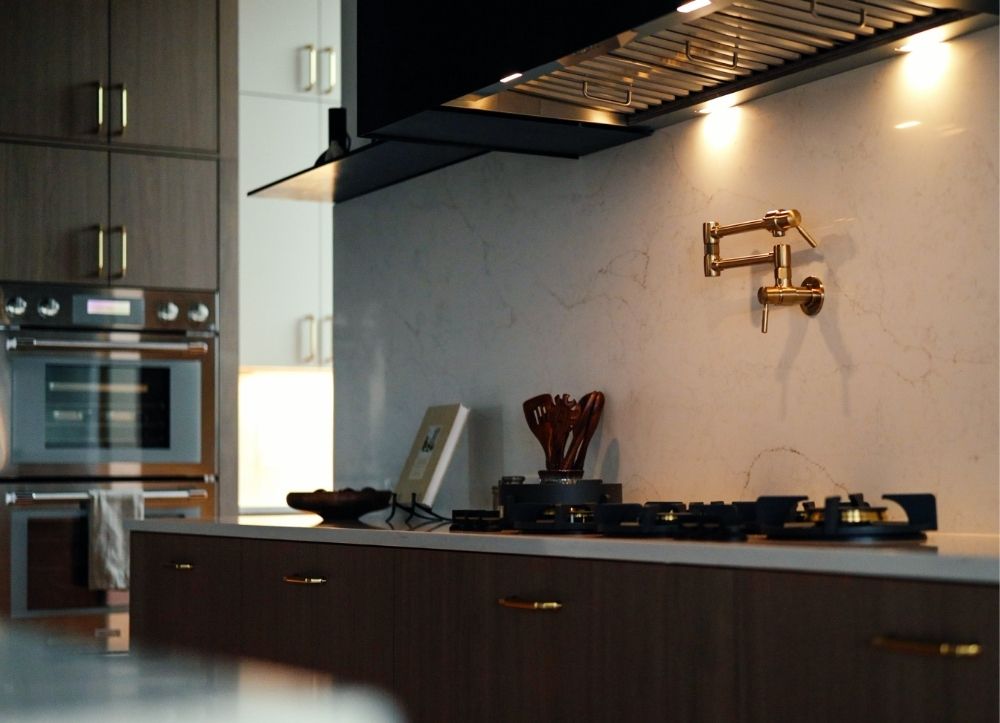 Professional Pitt Burners gas range with gold pot filler in Castle Rock gourmet kitchen