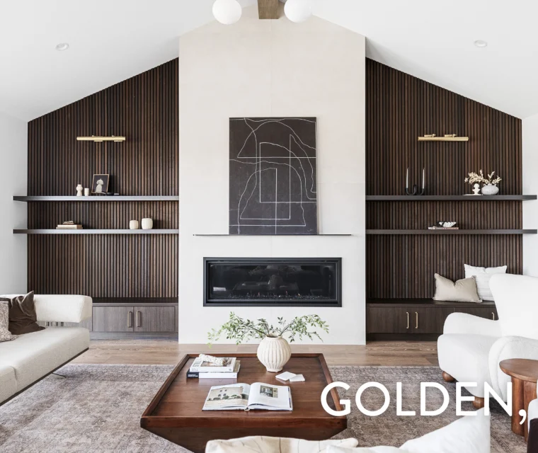 Contemporary living room with fireplace and custom textured shelving in Golden luxury home